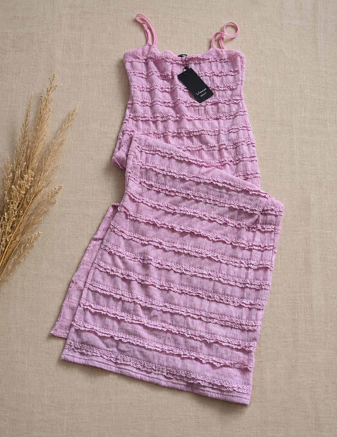 Robe rose texturée