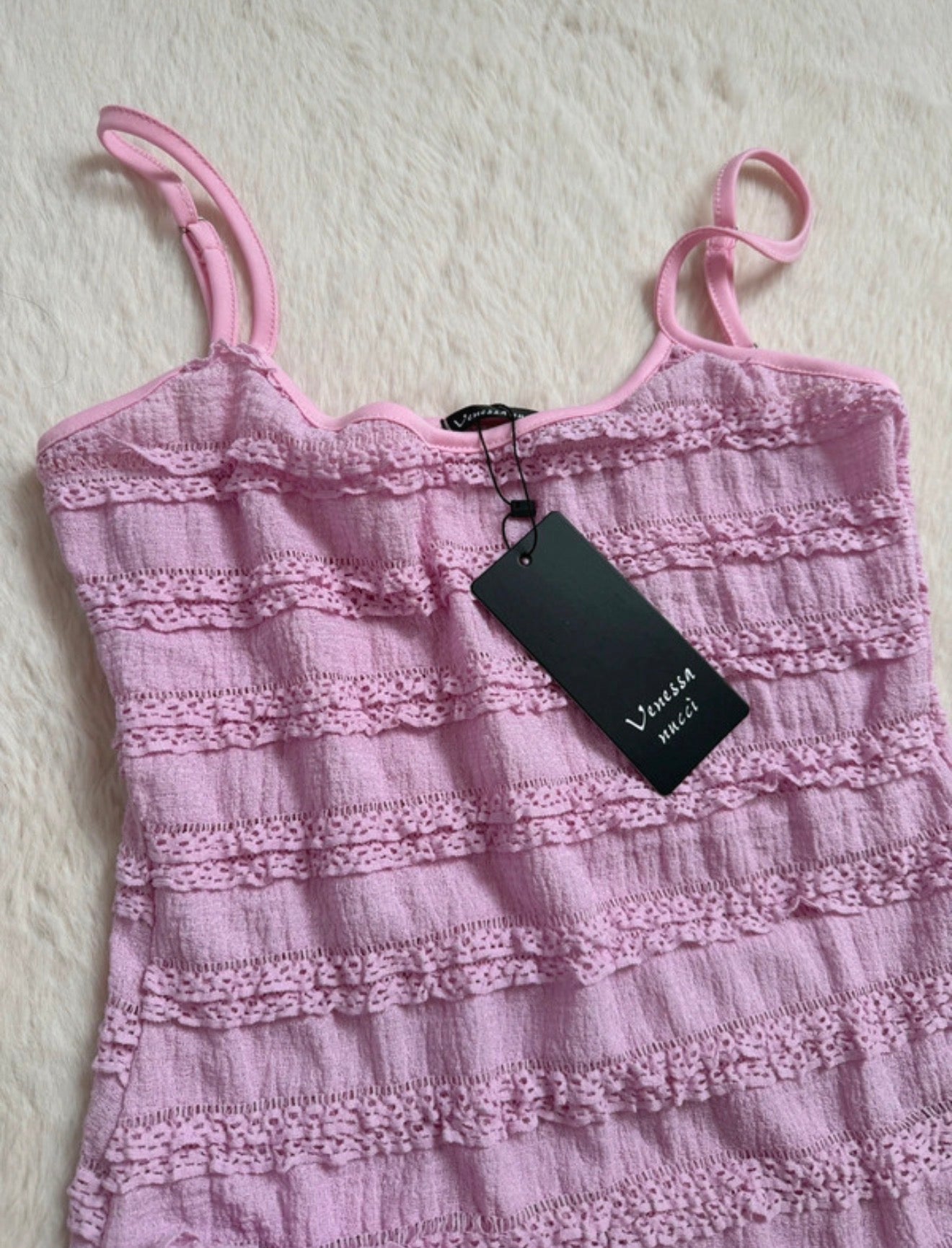Robe rose texturée